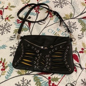 Olivia +Joy black crossbody with sliver hardware and adjustable strap.